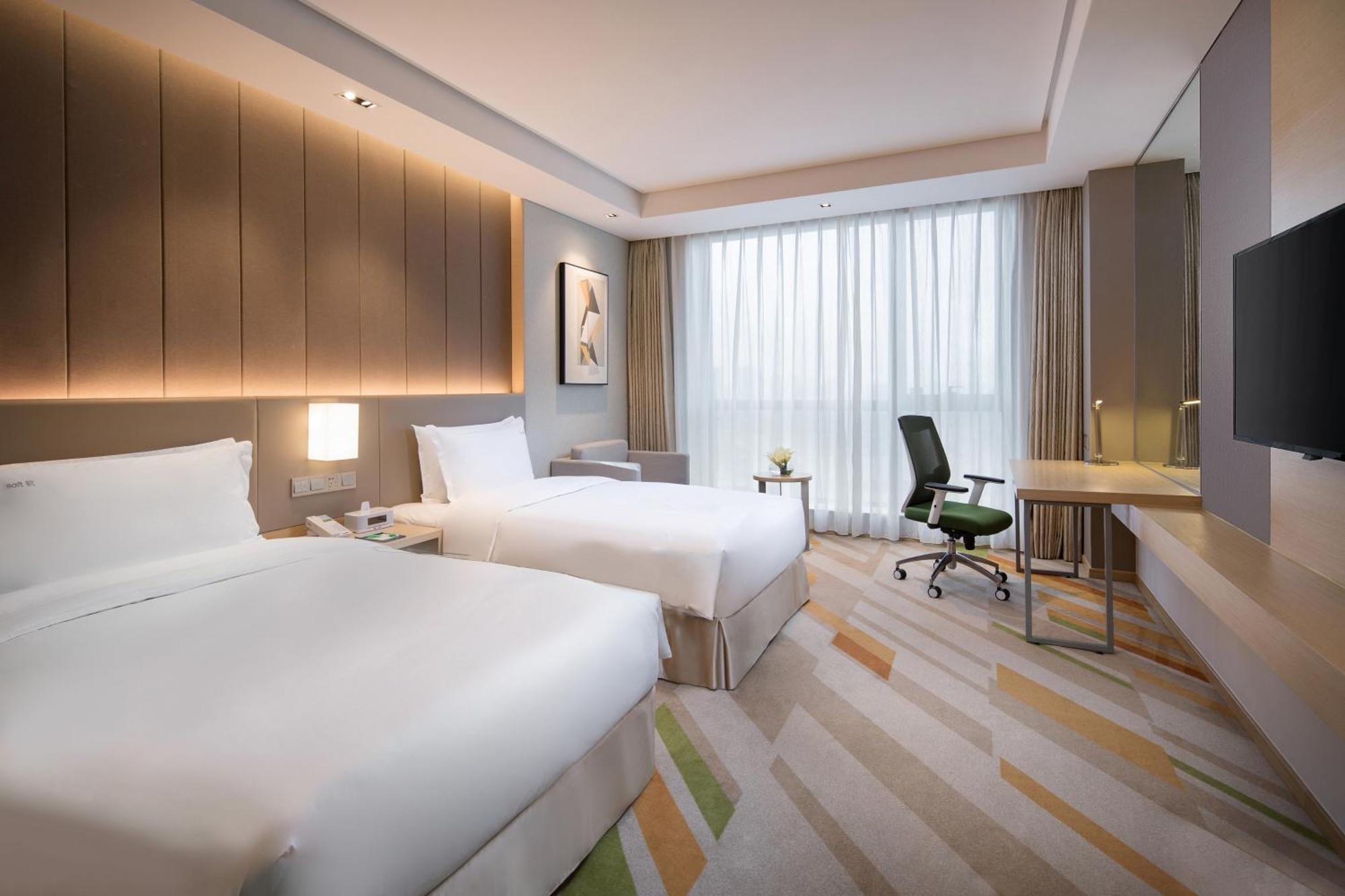 Holiday Inn Wuxi Taihu New City By Ihg Esterno foto